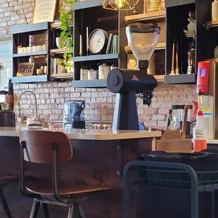 a bar with a coffee grinder