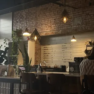 a woman sitting at a bar