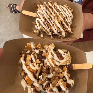 2 Ice cream dipped in milk chocolate. Marshmallow drizzle for the win