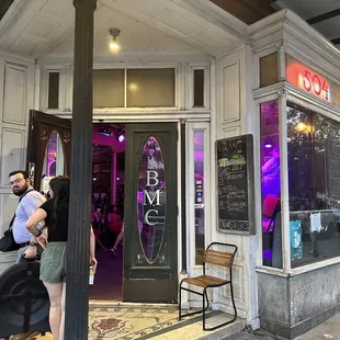 a man and a woman standing outside