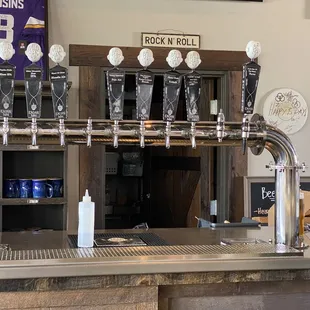 a bar with beer taps