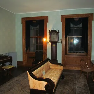 The 2nd floor study is graced with authentic original period pieces of furniture.