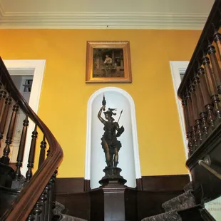 This metallic guardian keeps watch at the 2nd floor landing.