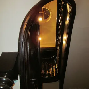 This dizzying view is from the base of the first floor stairway looking upward.