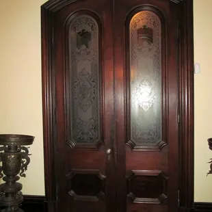 The dramatic curved main entranceway serves as a reminder of architecture-days-gone-by.