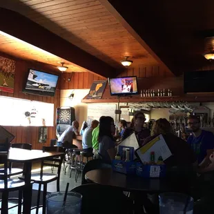a group of people sitting at tables