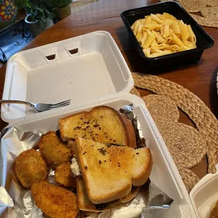 Brisket Rueben with side of jalapeño poppers and Mac and cheese.