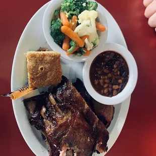 Ribs and baked beans were tasty. 8/10. Veggies were weak.