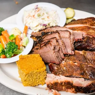 a plate of meat and vegetables