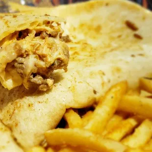 a burrito and french fries