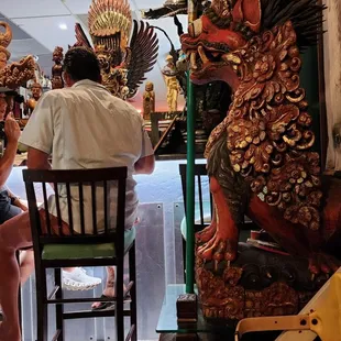 a man and woman sitting at a table