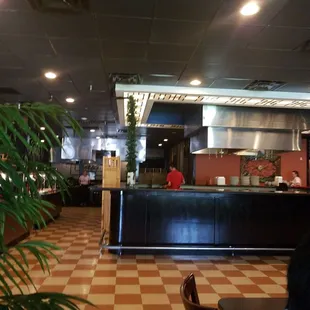 a restaurant with a checkered floor