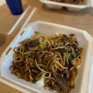 a plate of stir fried noodles