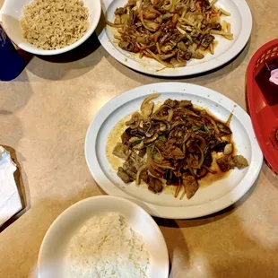 Bowls with hot sauce and combination sauce + rice