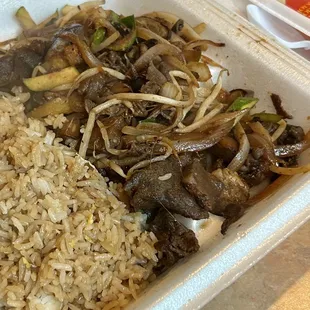 rice, beef, and vegetables in a styrofoam container