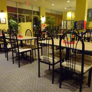 tables and chairs in a restaurant