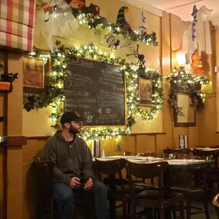 two people sitting in a restaurant
