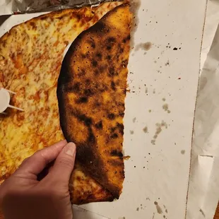 Burnt cheese pizza