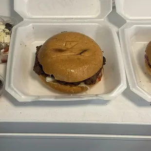 Balkan burger, 10 piece Ćevapi sandwich with traditional condiments, and 2 Greek salads and fries