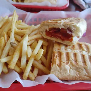 Pepperoni panini with fries