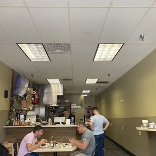 a group of people sitting at a table