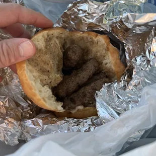 The Chevibe inside the big, thick, hamburger bun-type bread.