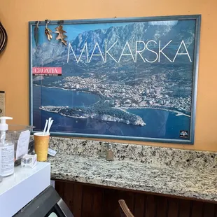 One of the pictures at the counter that I looked at while waiting for someone to decide to come out and help me.