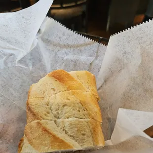 One of the bread rolls that comes before the meal