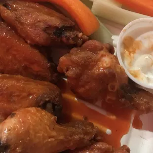 Buffalo wings with blue cheese and carrot/celery sticks.   So tasty!  Will definitely get these again