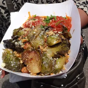 Roasted, dressed brussel sprouts (they were juicy) with walnut topping and vegetarian "balls"