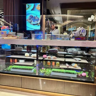 This woman was using the slicer when I arrived.  I'm not sure what all her duties are.  At the entrance.