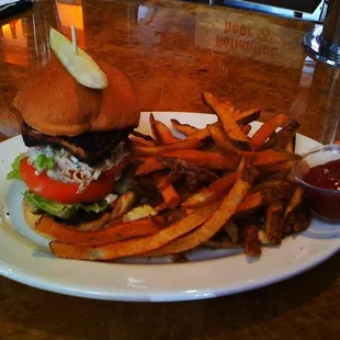 a burger and fries on a plate