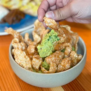 Chicharrones &amp; guac. Photo by @martiwantsmore
