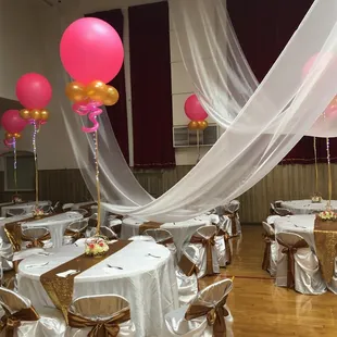 Large black light balloons with additional blinking twinkle lights made a big statement for this 15th birthday party. #balloonsbycarolyn