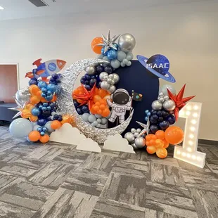 We provide any photo backdrop theme and custom signs. Located in Eastvale and service all of Ri reside county and more!  Balloon it!