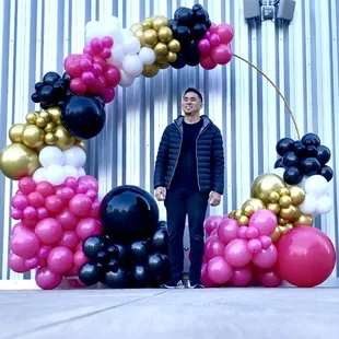 Balloon circle frame for charity walk at Aria .