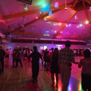 Sat. Night Party (large dance floor with happy dancers)