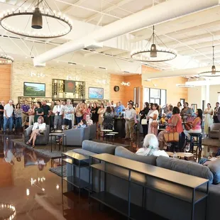 a large group of people in a large room