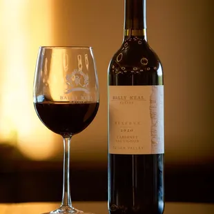 a glass and bottle of wine