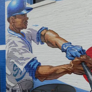 Celebrating ISU sports mural on the side of the Tavern by Michael Neary