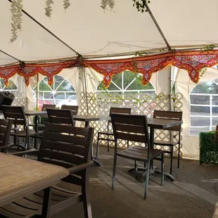 Nice covered seating with beautiful decorations