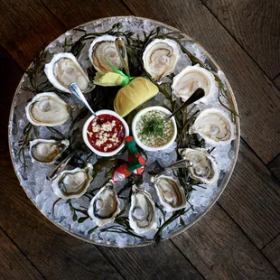 Freshly shucked oysters served with mignonette and cocktail sauce!