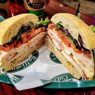 The Ft McHenry sandwich had turkey, bacon, brie, lettuce, tomato, onion, whole grain mustard, and mayonnaise in ciabatta bread.