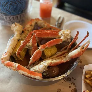 Yummmmy king crab and snow crab legs in garlic butter sauce