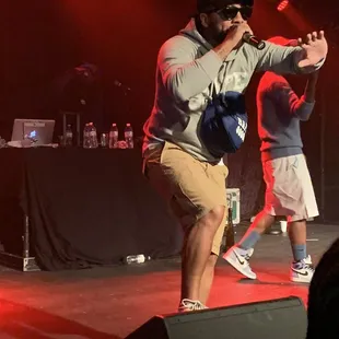 a man on stage with a microphone