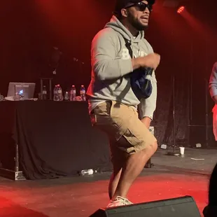 two men on stage performing