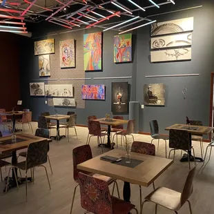 a restaurant with tables and chairs