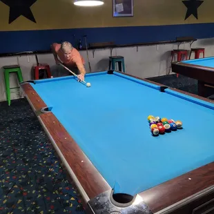 a man playing pool