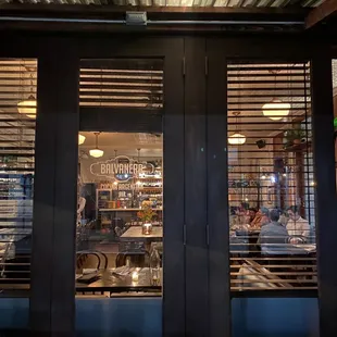 a view of a restaurant through the window