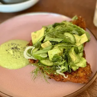 Milanesa * crispy breaded chicken cutlet, avocado salad, herb aioli